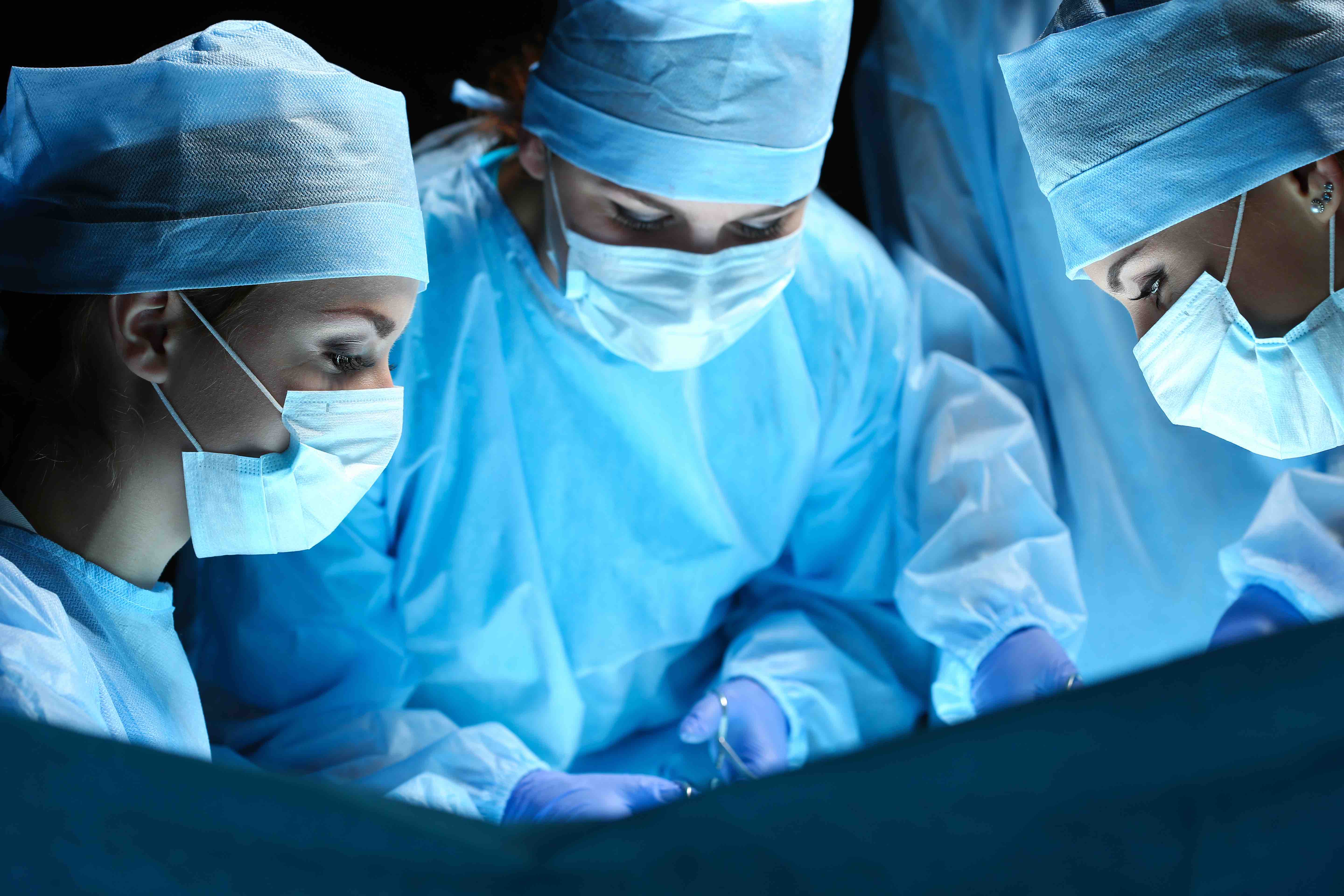 Surgeons in operating theatre 